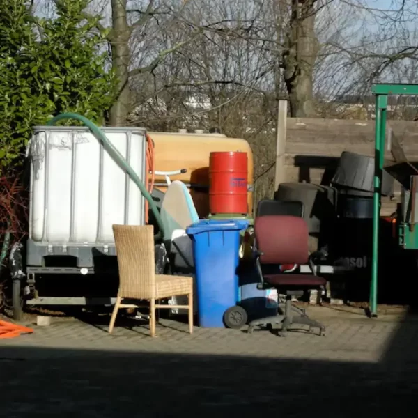 abandoned-chairs-containers-yard