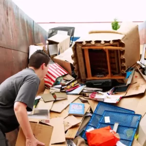 woman-with-cardboard-garbage-heap-truck